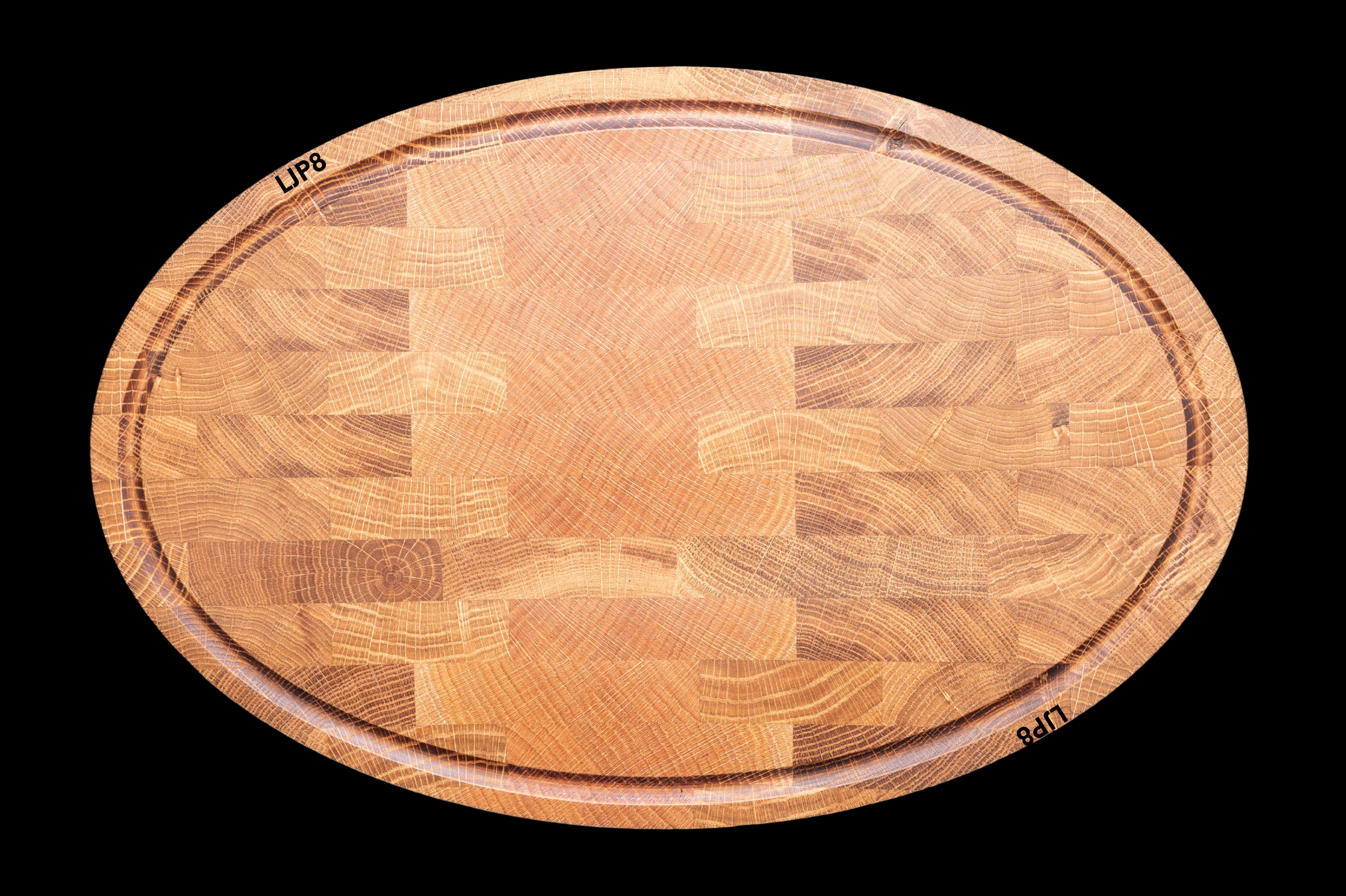 The Oval Oak End-Grain Cutting Board